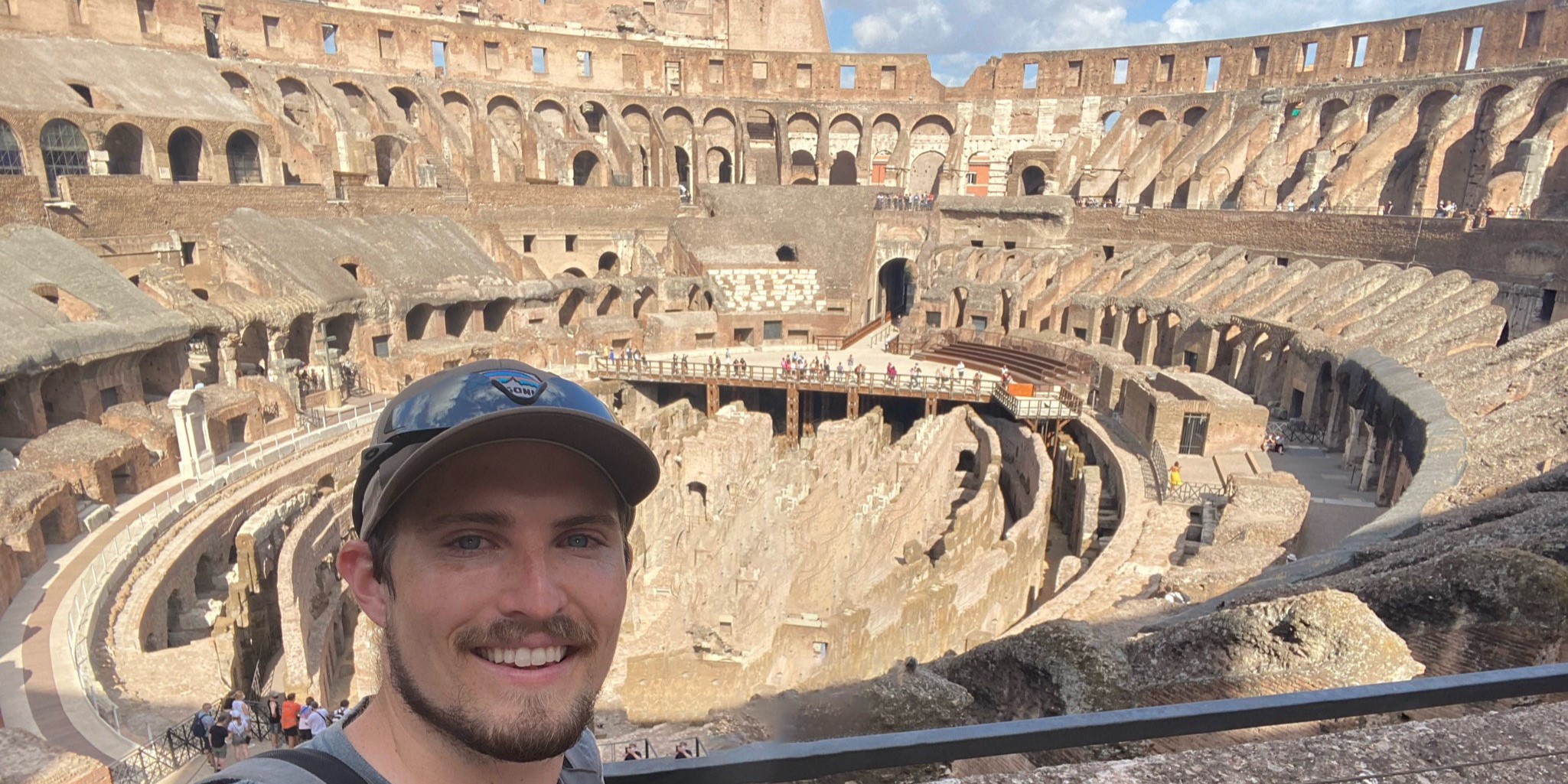 Photo of Nicholas inside the Roman Colosseum